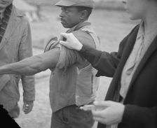 Vaccination in the camp for Negro flood refugees at Marianna, Arkansas, 1937. Creator: Walker Evans