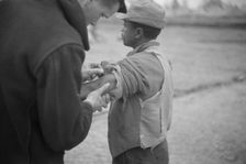 Vaccination in the camp for Negro flood refugees at Marianna, Arkansas, 1937. Creator: Walker Evans