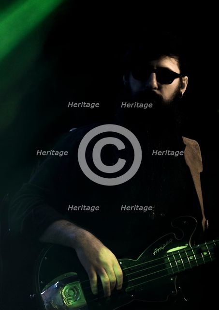 Valerie June's bass player, 2017. Artist: Alan John Ainsworth.