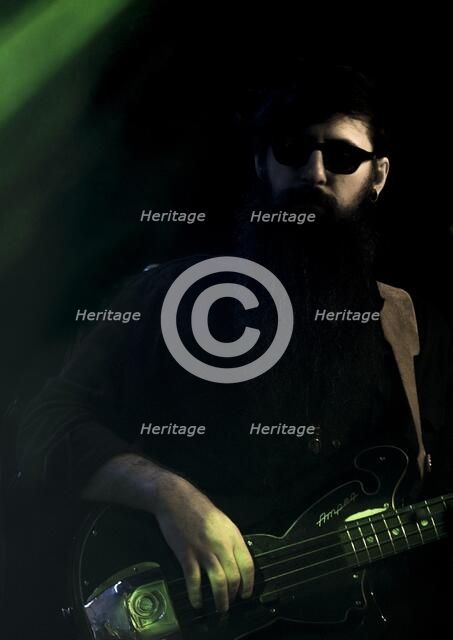 Valerie June's bass player, 2017. Artist: Alan John Ainsworth.