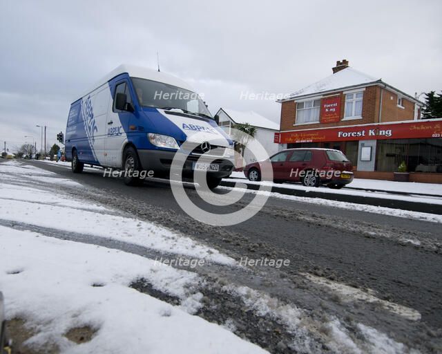 Van driving in slush, Blackfield 2009 Artist: Unknown.