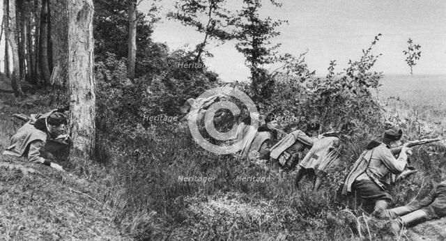 Vanguard of Austro-Hungarian Uhlans occupying a clearing in a forest, World War I, 1917. Artist: Unknown