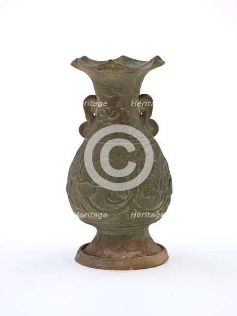 Vase with fluted mouth and molded floral design, early 1200s. Creator: Unknown.