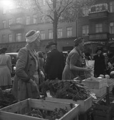 Vegetable stall in the market, Malmö, Sweden, 1947. Creator: Otto Ohm
