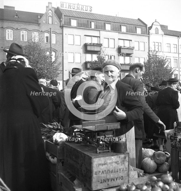 Vegetable stall in the market, Malmö, Sweden, 1947. Creator: Otto Ohm.