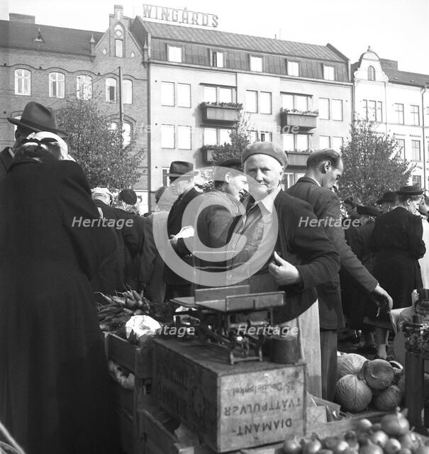 Vegetable stall in the market, Malmö, Sweden, 1947. Artist: Otto Ohm