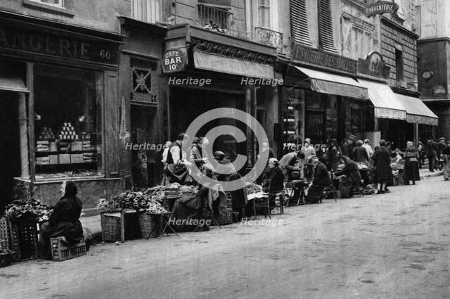 Vegetable sellers in the Central Market quarter, Paris, 1931.Artist: Ernest Flammarion