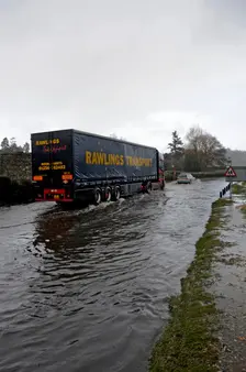 Vehicles on Flooded road at Beaulieu 2008