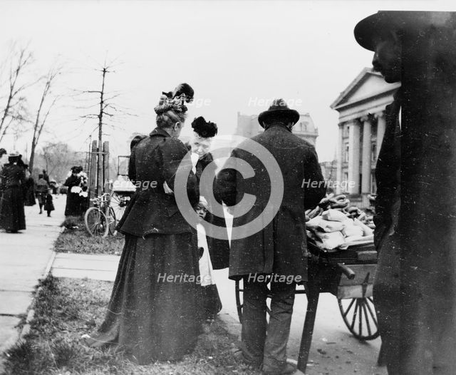 Vendor and cart near the White House during the egg rolling, 1898. Creator: Frances Benjamin Johnston.