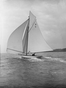 Ventana (H11), an early 8 Metre yacht, running downwind under spinnaker, 1913. Creator: Kirk & Sons of Cowes