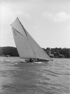 Ventana (H11) an early 8 Metre class yacht sails close-hauled, 1914. Creator: Kirk & Sons of Cowes
