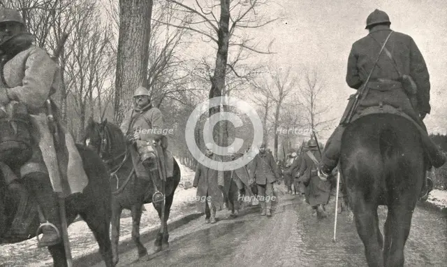 'Verdun; Apres l'attaque: 68 Allemands, pris au bois des Caures, entrent a Verdun...1916', 1924) Creator: Unknown.