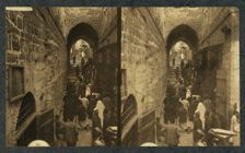 Via Dolorosa, Jerusalem. Pilgrims at station of the Cross (Stereograph), 1913