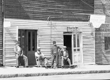 Vicksburg Negroes and shop front, Mississippi, 1936. Creator: Walker Evans