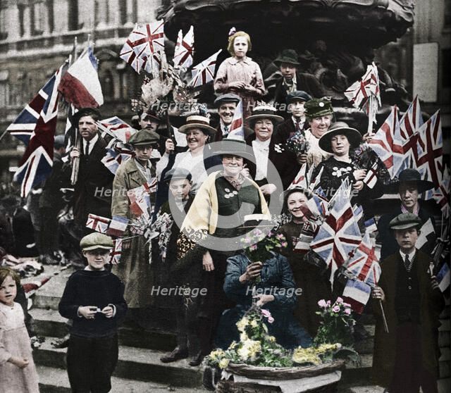 Victory celebrations underneath Eros, Piccadilly, London, 1918, (1938). Artist: Unknown.