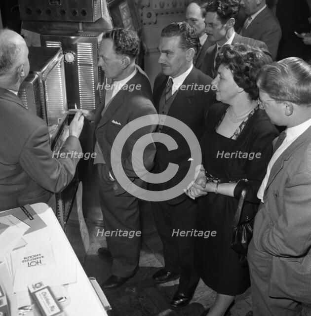 Viewing new barbeque ovens, Wilsic, near Doncaster, South Yorkshire, 1961.  Artist: Michael Walters