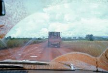 View through muddy windsreen on African dirt road