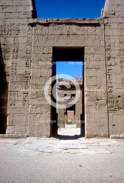 View through the Pylons, Mortuary Temple of Rameses III, Medinat Habu, Luxor, c12th century BC. Artist: Unknown