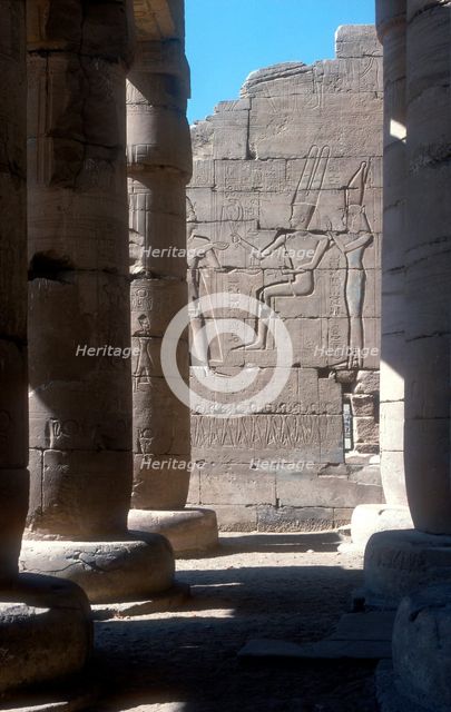 View through to relief of Rameses II before Amun & Mut, Temple of Rameses II, Luxor, Egypt. Artist: Unknown