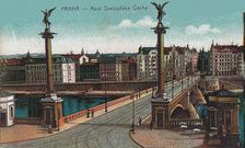 View across Vltava river looking at Cech Bridge and Old Town, c. 1910. Creator: Anonymous
