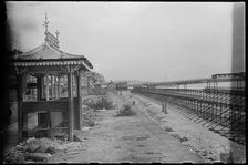View along the Esplanade from beside a shelter, showing Admiralty scaffolding, Shanklin, IoW, 1945. Creator: George R Long