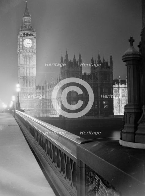 View at night along the south parapet of Westminster Bridge towards... Big Ben, early 1960s. Creator: John Gay.