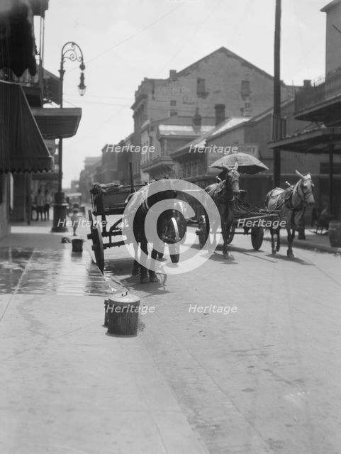 View down a street, New Orleans or Charleston, South Carolina, between 1920 and 1926. Creator: Arnold Genthe.