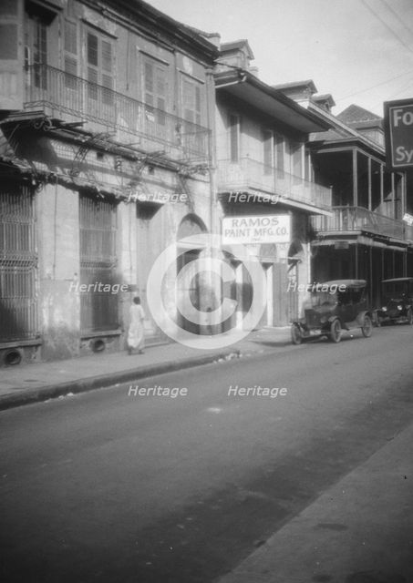 View down a street, New Orleans, between 1920 and 1926. Creator: Arnold Genthe.
