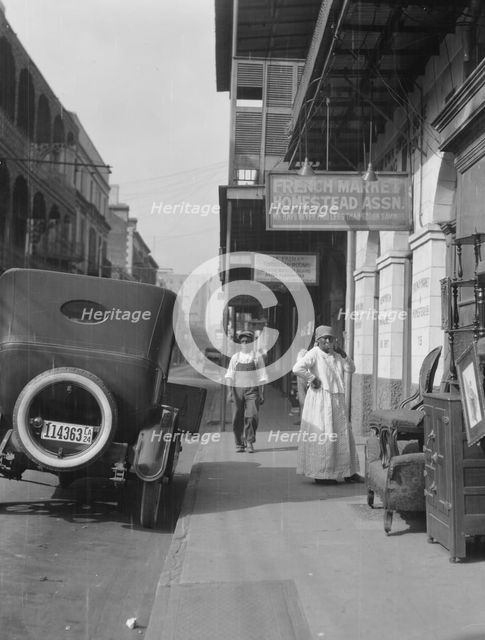 View down a street, New Orleans, between 1920 and 1926. Creator: Arnold Genthe.