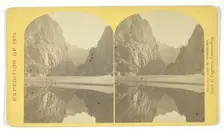 View down Black Cañon, from Mirror Bar. The walls repeated by reflection, 1871. Creator: Tim O'Sullivan
