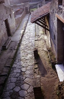 View down Cardo IV (street) from the balcony of the Casa a Graticcio, Herculaneum, Italy