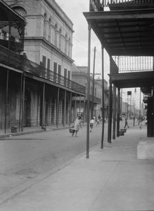 View down Royal Street to the "Haunted House" (Lalaurie House), New Orleans, between 1920 and 1926. Creator: Arnold Genthe