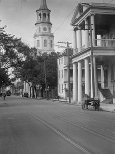 View down street to St. Michael's Church, Charleston, South Carolina, between 1920 and 1926. Creator: Arnold Genthe