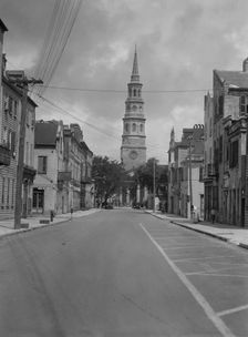 View down street to St. Philip's Church, Charleston, South Carolina, between 1920 and 1926. Creator: Arnold Genthe