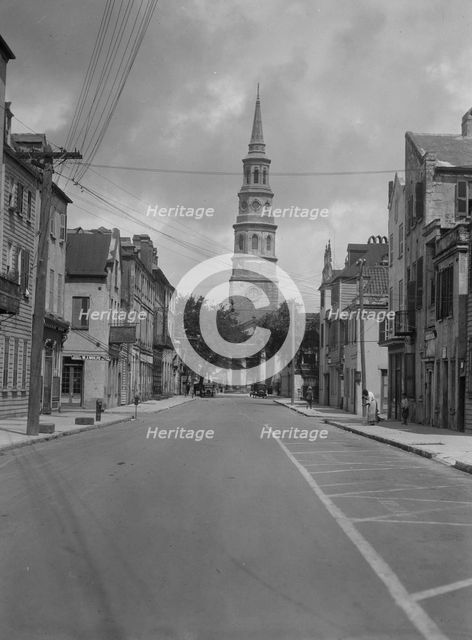 View down street to St. Philip's Church, Charleston, South Carolina, between 1920 and 1926. Creator: Arnold Genthe.