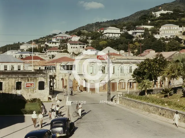 View down the main street from the Grand Hotel, Charlotte Amalie, St. Thomas Island, V.I., 1941. Creator: Jack Delano.