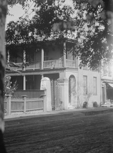 View from across street of a multi-story house, [25 Franklin Street], Charleston..., c1920-1926. Creator: Arnold Genthe