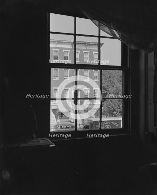 View from the bedroom window of Mrs. Ella Watson, a government worker, Washington, D.C., 1942. Creator: Gordon Parks.
