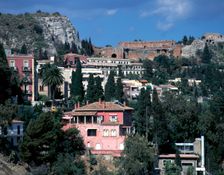 View from Via Roma to Greek theatre, Taormina, Sicily, Italy. Creator: Peter Thompson