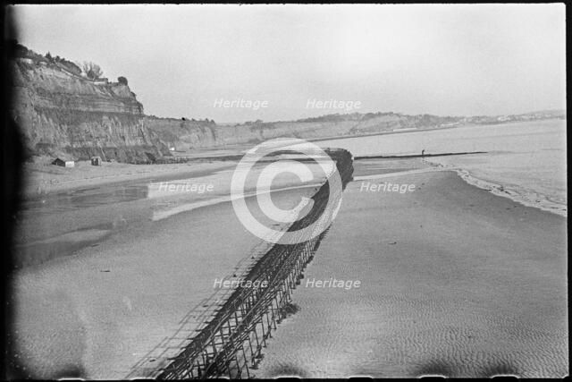 View looking north-east from Shanklin Beach, showing Admiralty scaffolding, Isle Of Wight, 1945. Creator: George R Long.