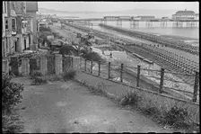 View looking south along the beach at Shanklin, showing Admiralty scaffolding, Isle Of Wight, 1945. Creator: George R Long