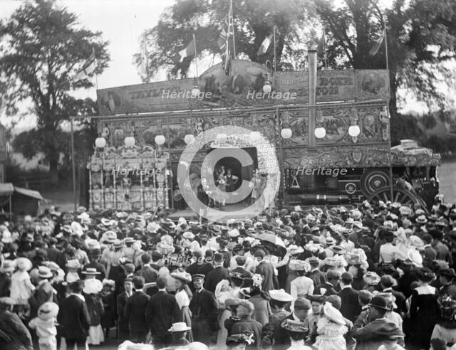 View of Taylor's Cinematograph show and crowd at Witney Fair, Witney, Oxfordshire, 1860-1922. Creator: Henry Taunt.