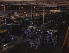 View of the B-25 final assembly line at North American Aviation's Inglewood, California, plant, 1942 Creator: Alfred T Palmer