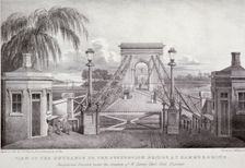 View of the entrance to the suspension bridge at Hammersmith... London, 1827. Artist: Thomas Mann Baynes