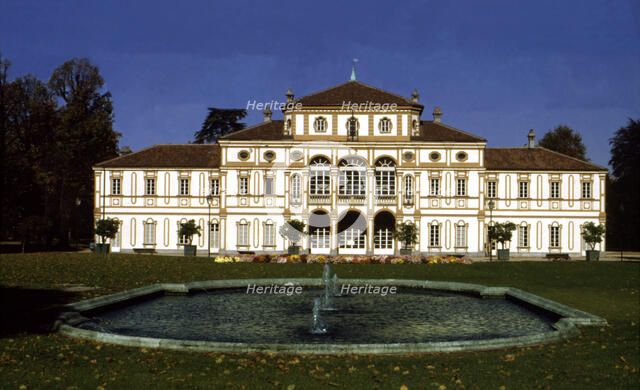 View of the exterior of the building and gardens of the Treasury Villa.