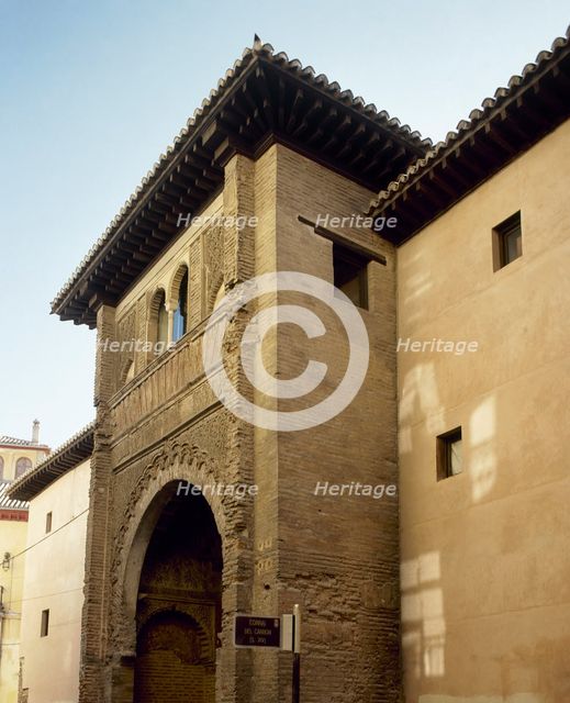 View of the facade with large horseshoe arch, Corral del Carbon, Granada, Andalusia, Spain (2002).  Creator: LTL.