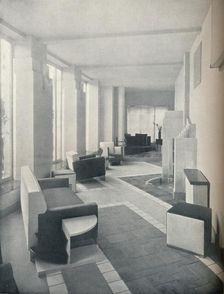 View of the Sun Room in daylight, showing the three windows and columns 1930