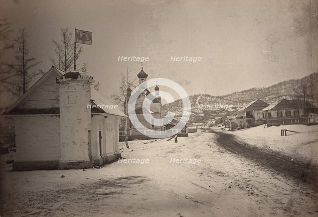 View of a settlement or village with a government(?) building and a church..., between 1885 and 86. Creator: Unknown.