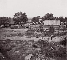 [View of a small town with wooden sheds in distance]. Brady album, p. 123, 1861-65. Creator: Unknown