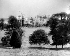 View of building across from fields, c1882